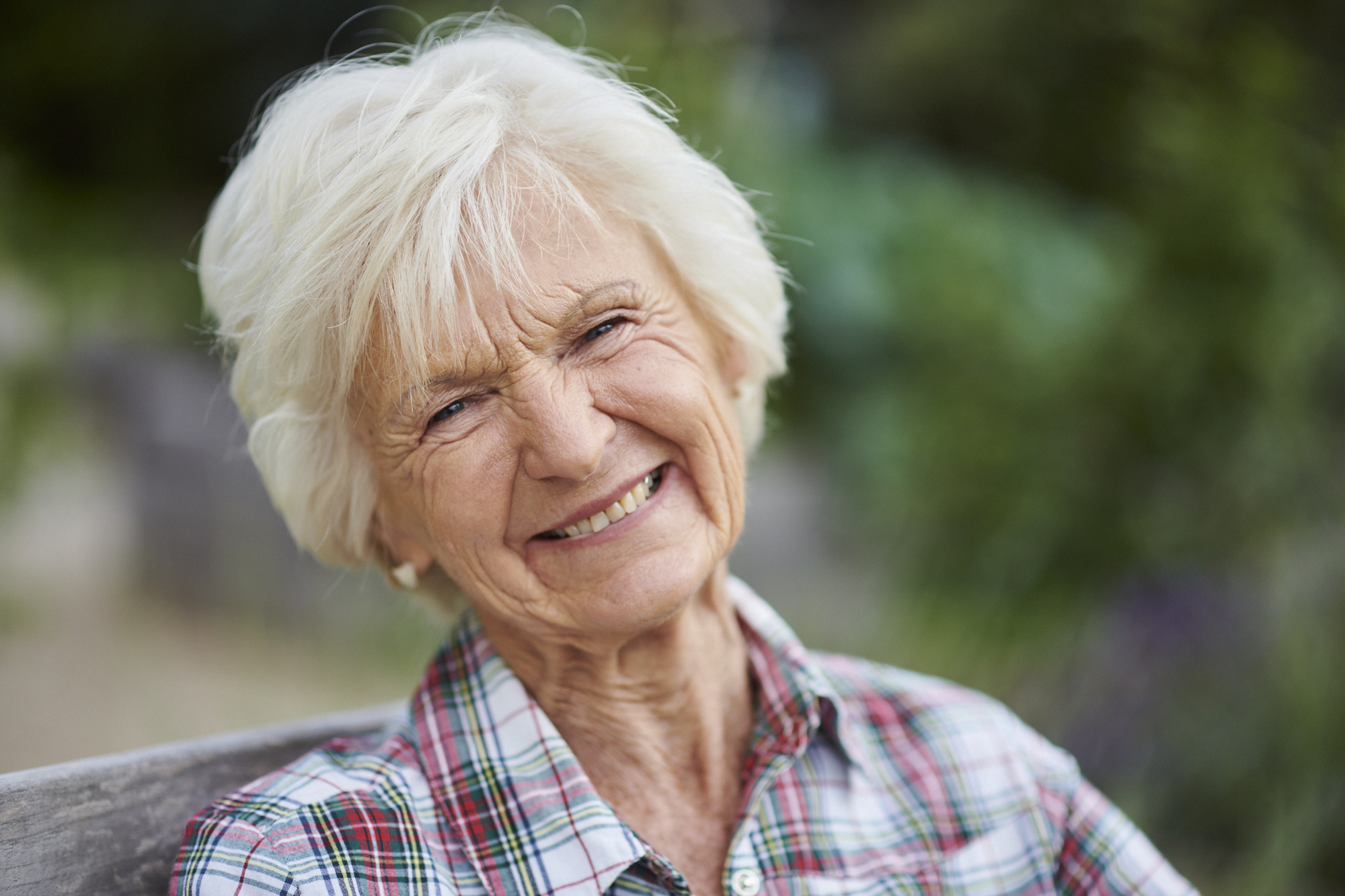 A woman smiling at the camera