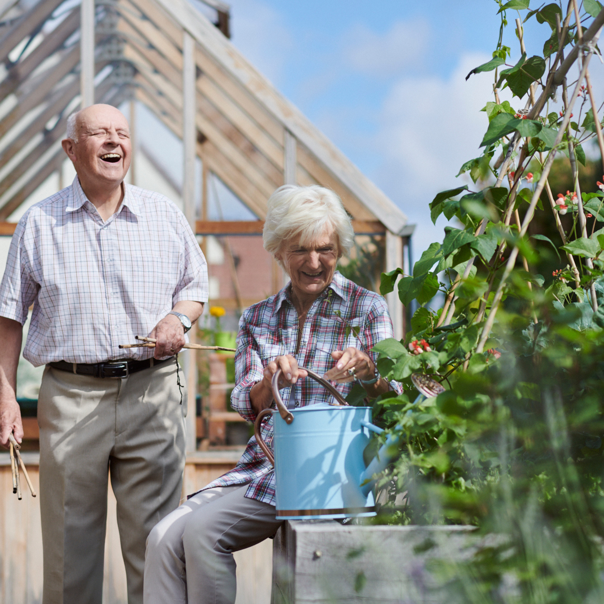Two people gardening