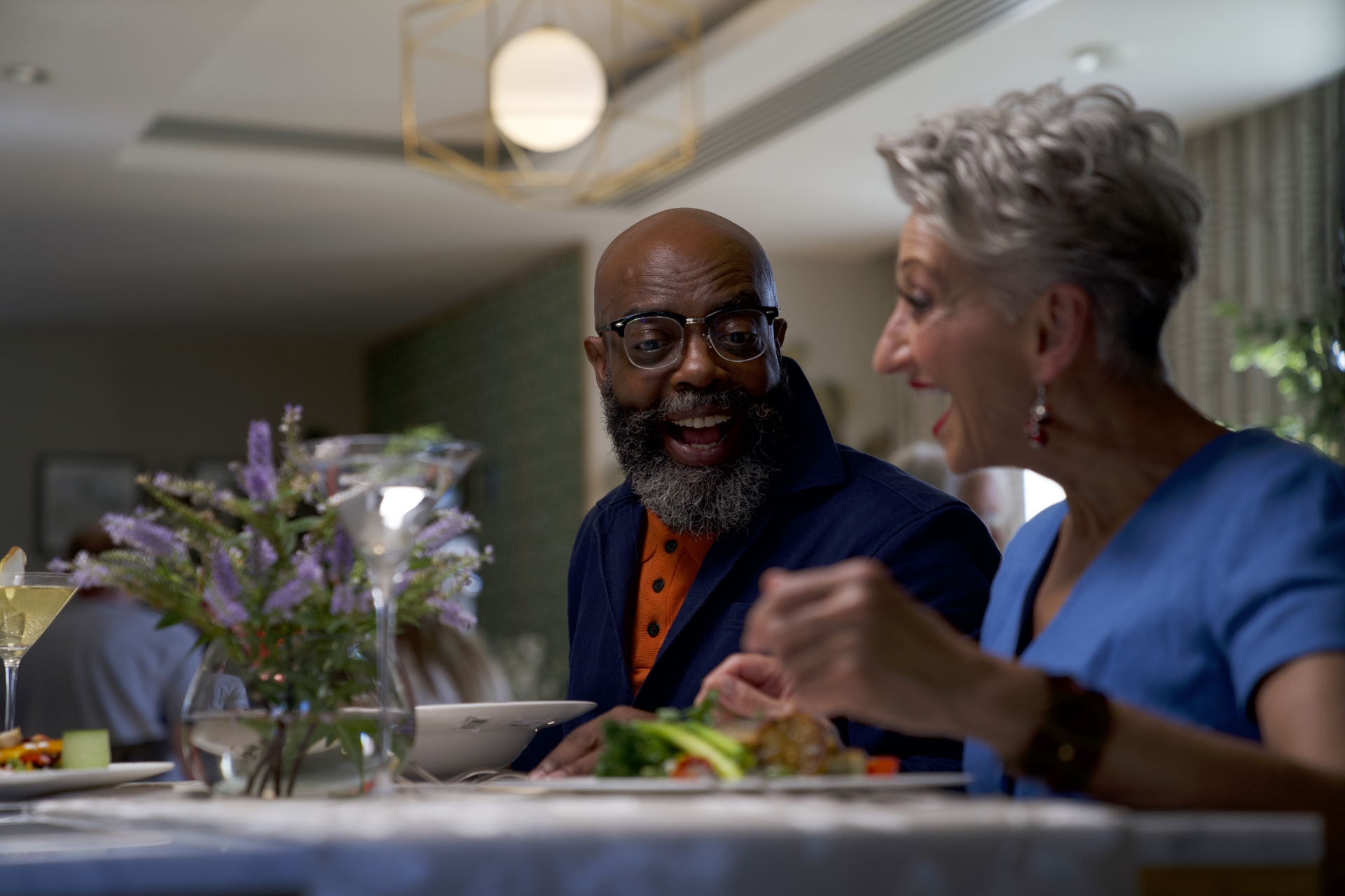Two people laughing