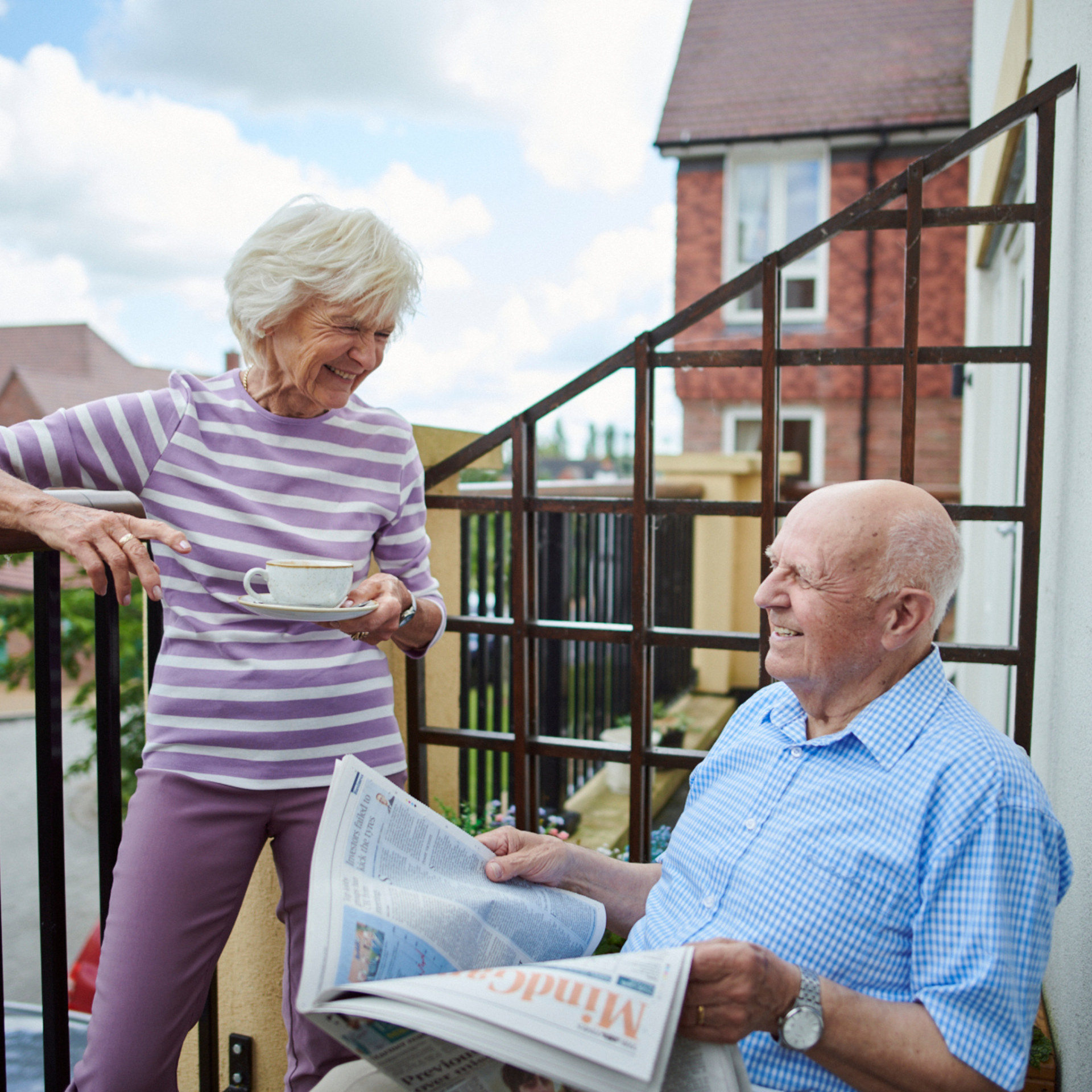 Two people on balcony