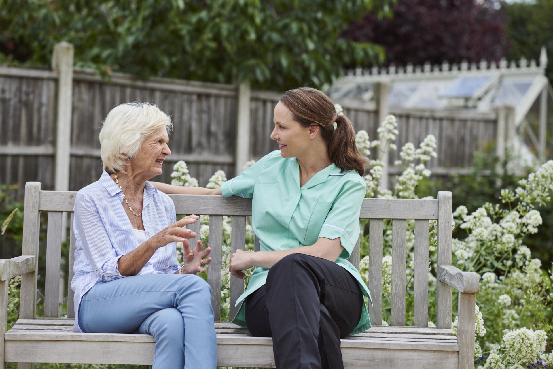 Lady and carer on bench