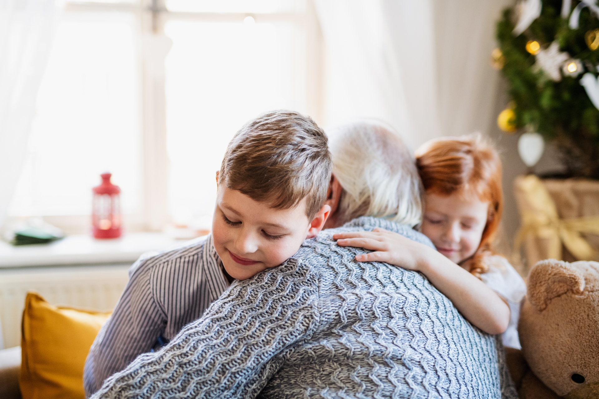 Granddad with grandchildren in retirement property