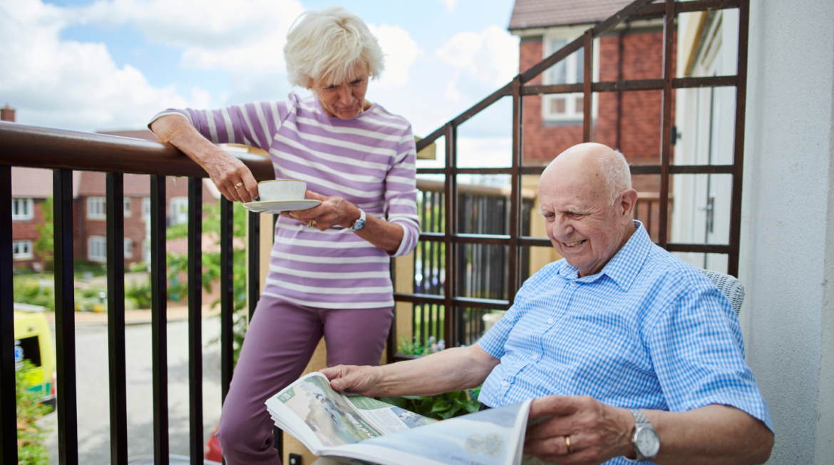 Two people on a balcony