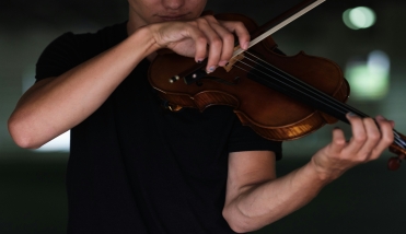 A person playing a violin