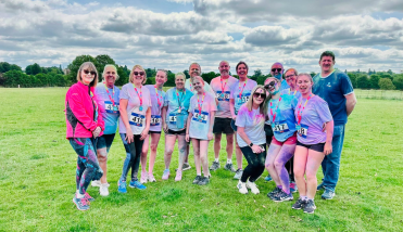 Group of people standing in a field