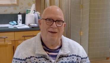 MALE RESIDENT SMILING