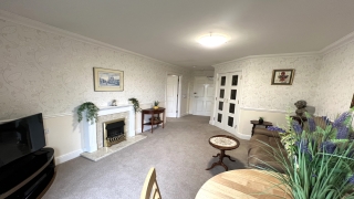 Living room with glass panel door